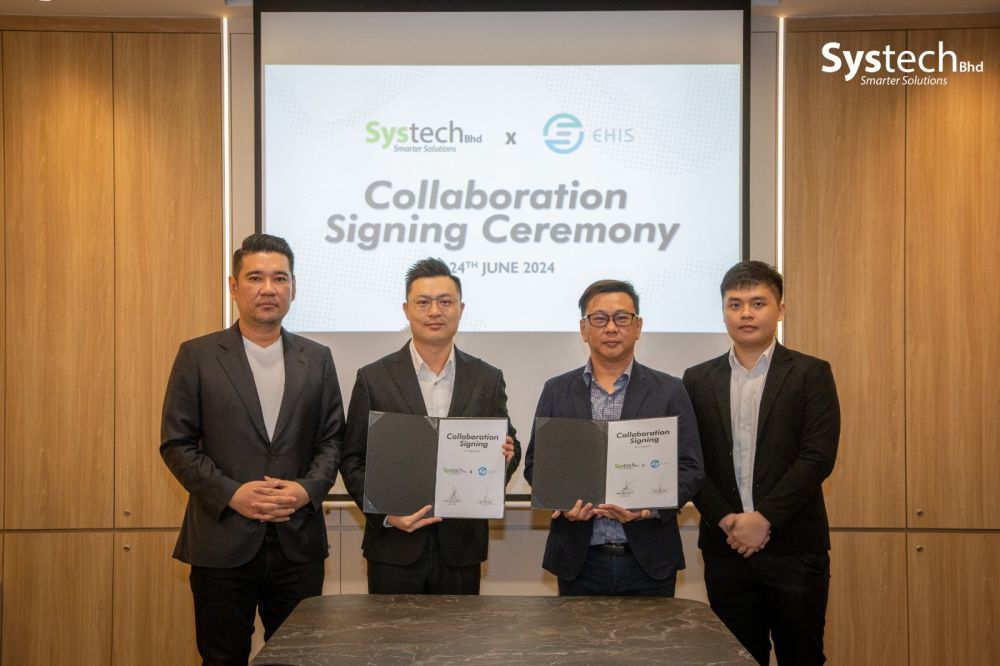 Dato Philip Ng, Executive Director of Systech Berhad; Dato' Derrick Hooi, Executive Director of Systech Berhad; Mr. Sim Chin Yee, Director of EH Integrated System Sdn. Bhd.; Mr. Lee Yong Hou, Business Manager of EH Integrated System Sdn. Bhd. [L–R]
