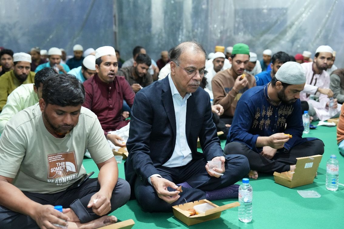 Mr Muhammed Aziz Khan (centre), Founder Chairman of Summit Group, broke fast with migrant workers in Singapore, many of whom are Bangladeshi nationals